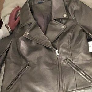 Very cute.were any were leather Grey jacket